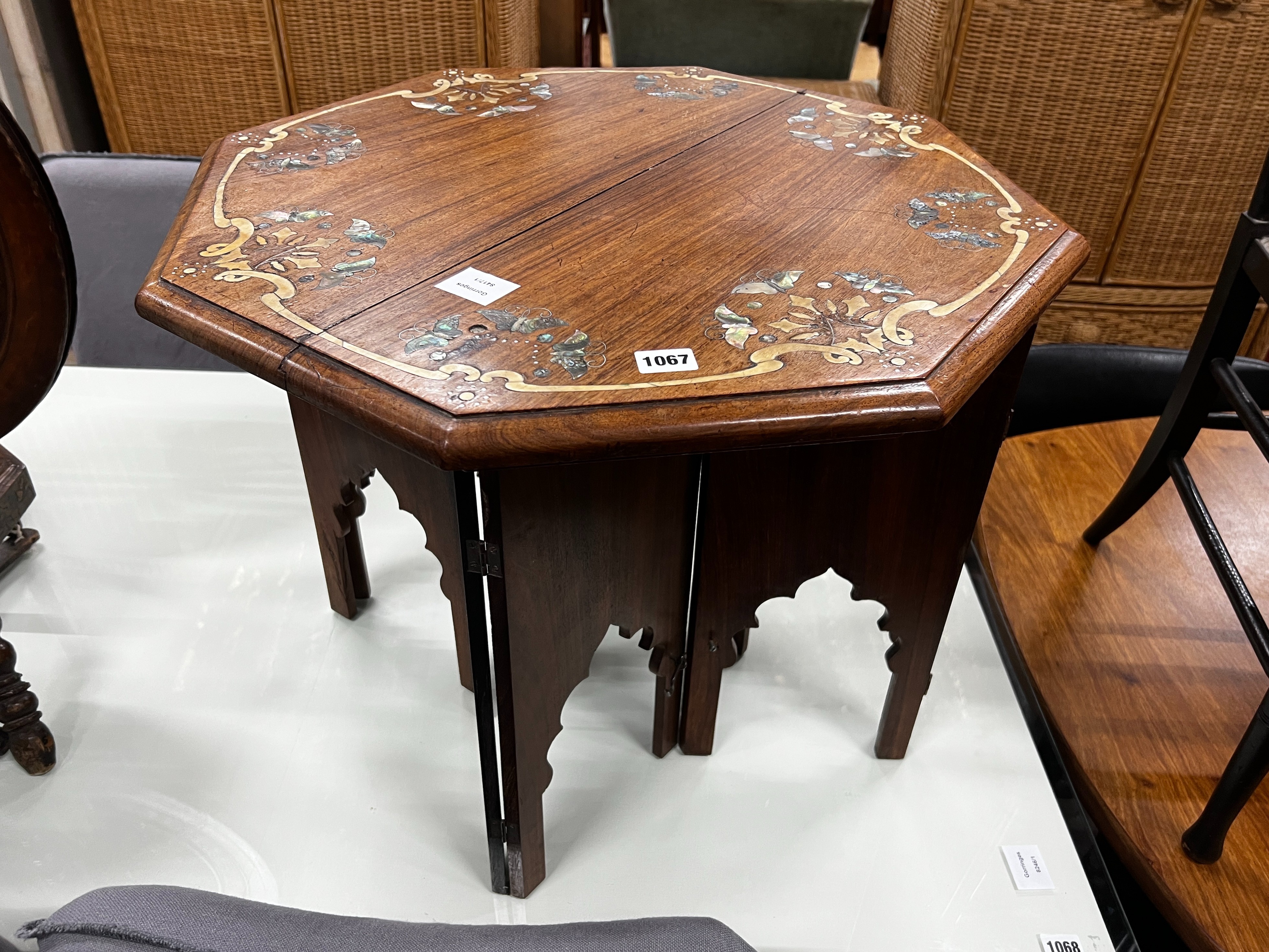 An Indian “Mysore Arts & Crafts” Abalone inlaid octagonal hardwood Moorish style table with folding stand, width 60cm, height 50cm